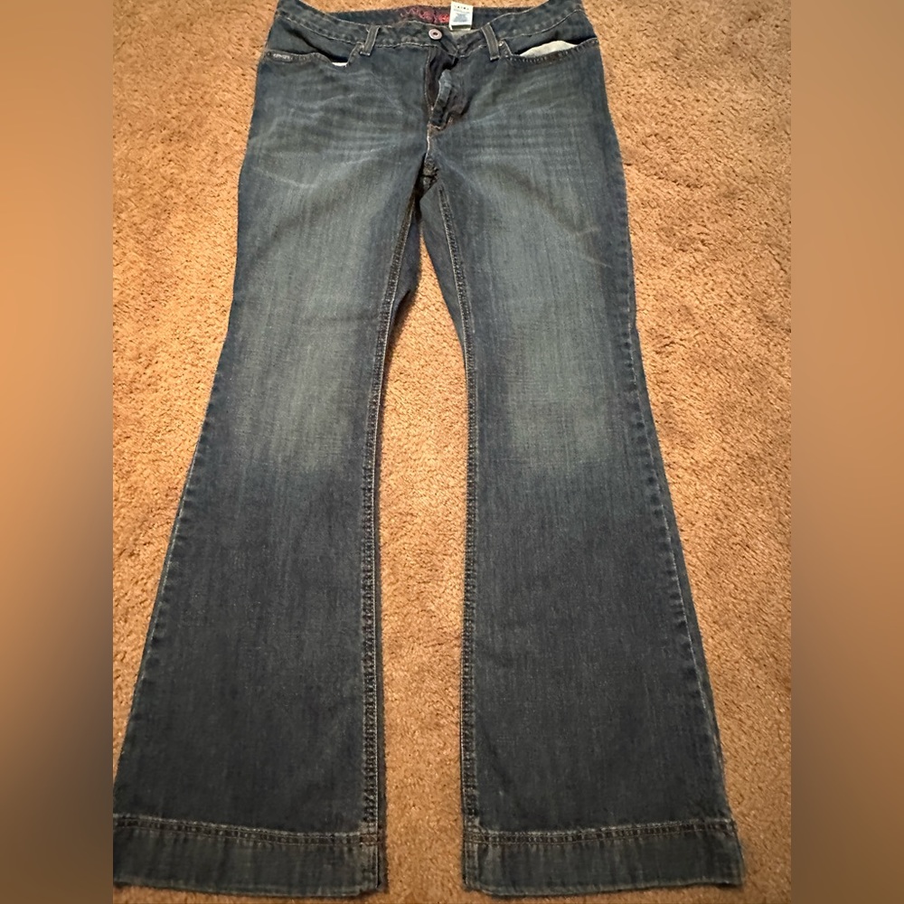 LIKE NEW FLARE CINCH JEANS
